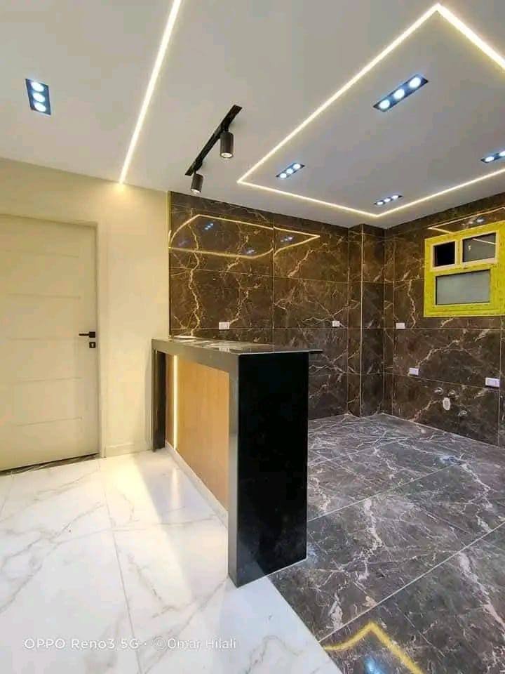 مطبخ مكسو بالرخام